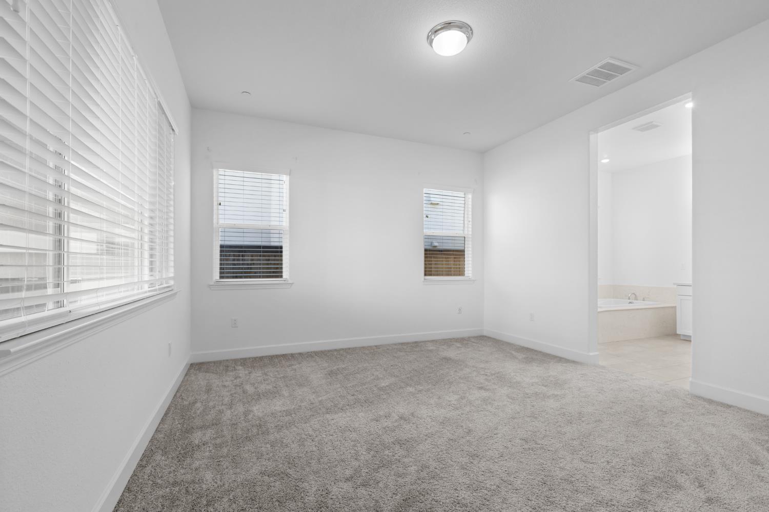 4236 Bellwether Way Sacramento, CA 95835 - Photo 19 of 57 an empty room with windows