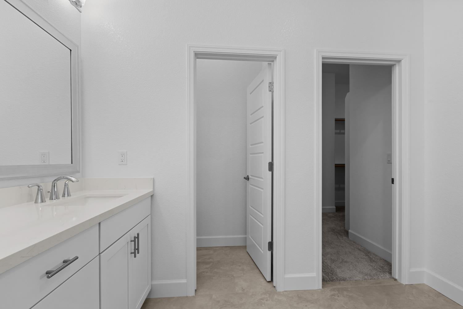 4236 Bellwether Way Sacramento, CA 95835 - Photo 28 of 57 a bathroom with a sink and a mirror