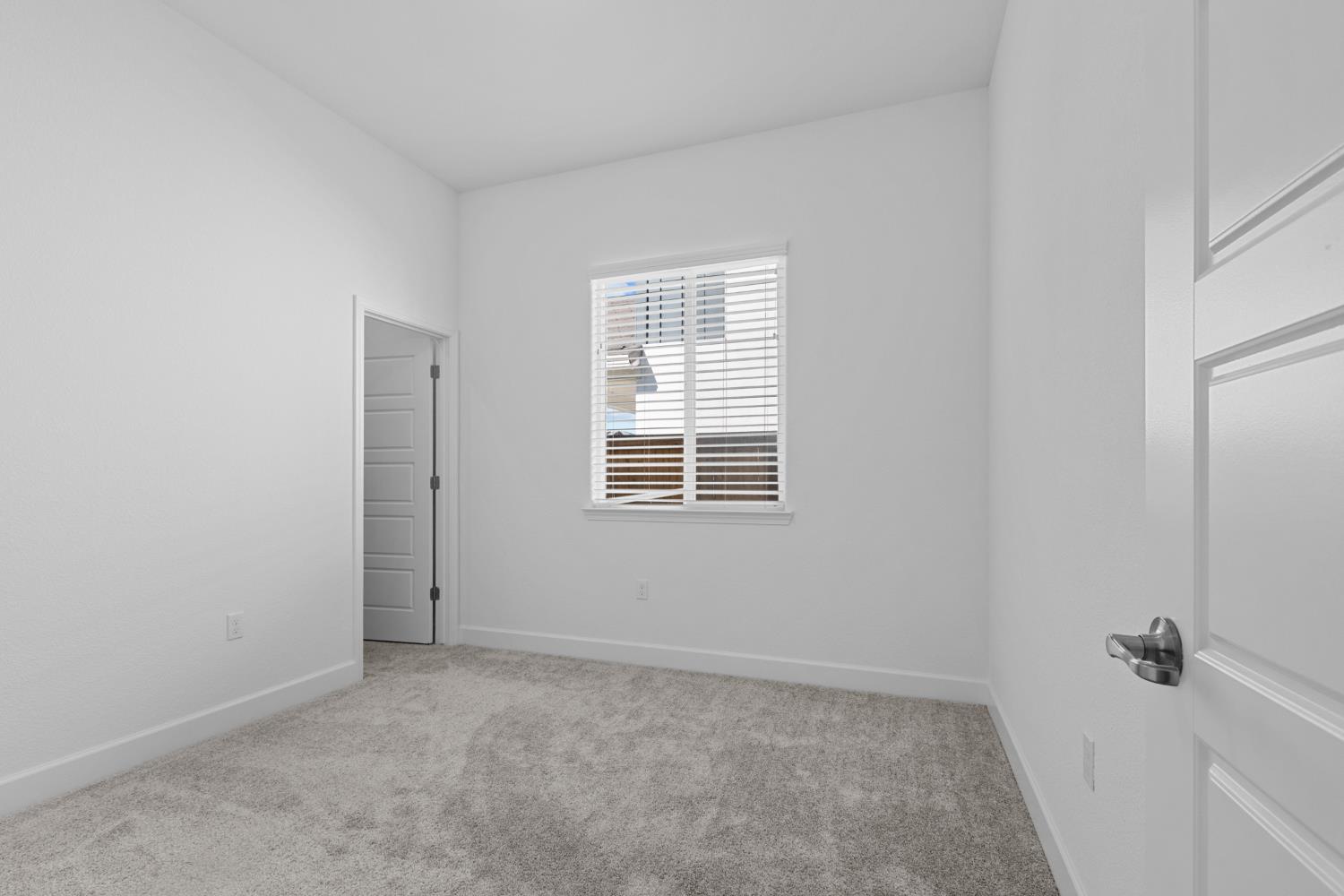 4236 Bellwether Way Sacramento, CA 95835 - Photo 30 of 57 a view of an empty room with a window