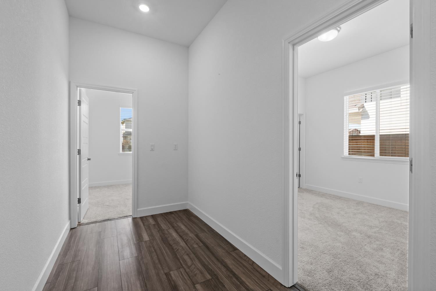 4236 Bellwether Way Sacramento, CA 95835 - Photo 31 of 57 an empty room with wooden floor and windows