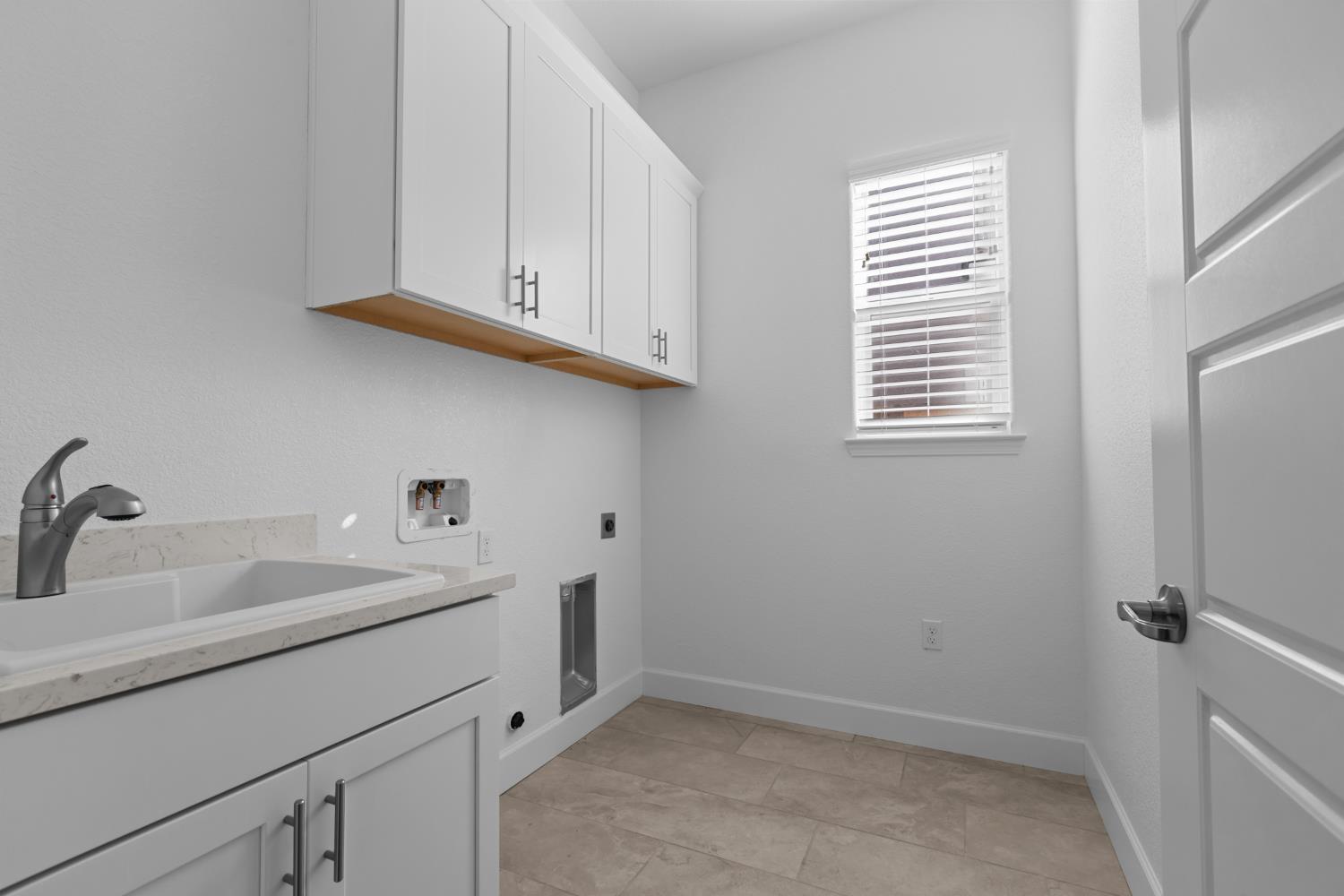 4236 Bellwether Way Sacramento, CA 95835 - Photo 35 of 57 a bathroom with a sink and a window