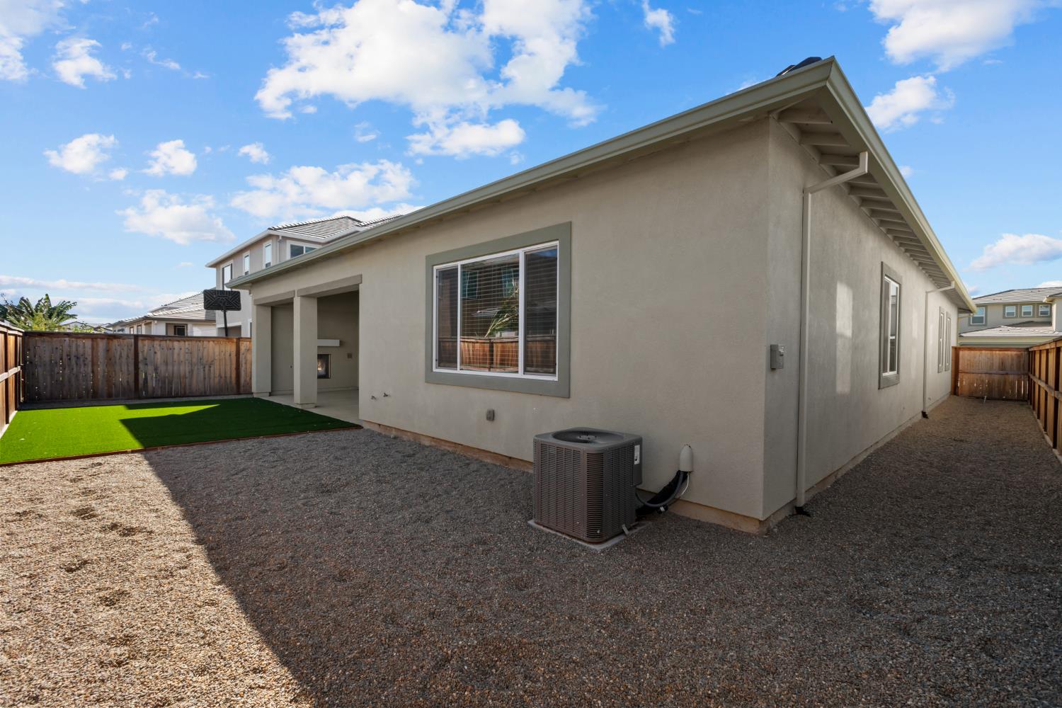 4236 Bellwether Way Sacramento, CA 95835 - Photo 41 of 57 a backyard of a house with barbeque oven and table