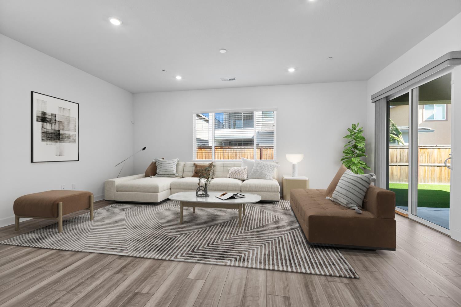 4236 Bellwether Way Sacramento, CA 95835 - Photo 6 of 57 a living room with furniture and wooden floor