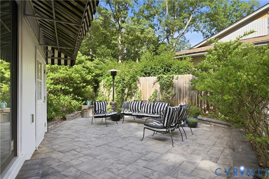 6405 Buckhill Road Richmond, VA 23225 - Photo 64 of 71 Spacious paver patio bordered by lush landscaping