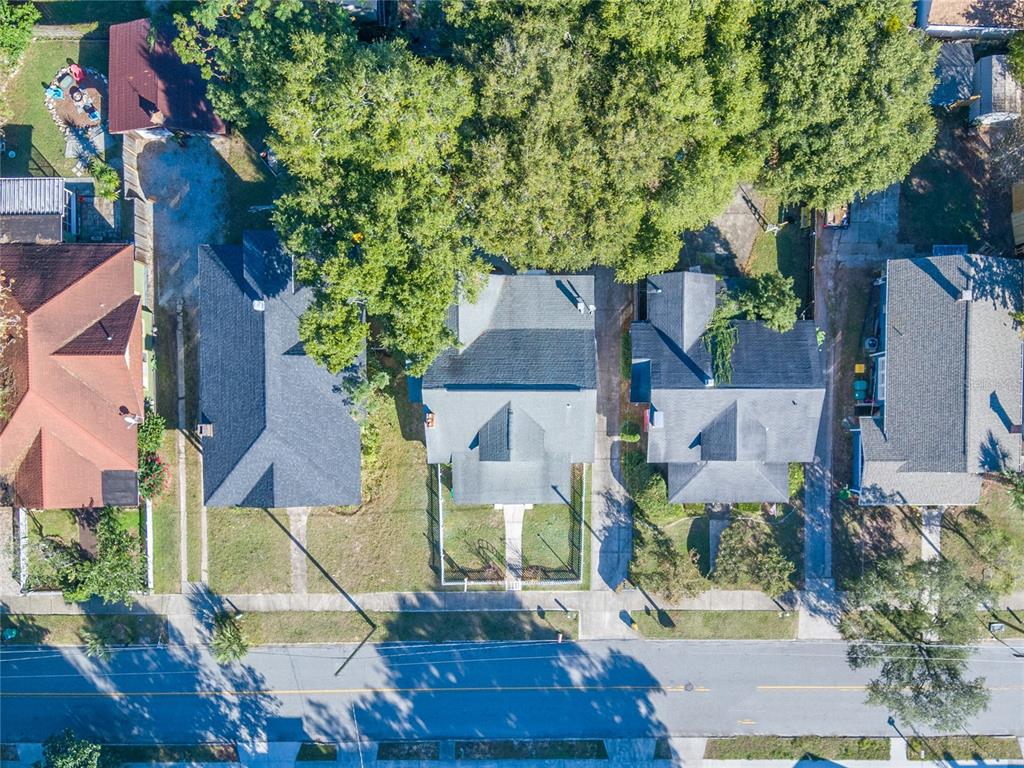 427 East Washington Avenue Eustis, FL 32726 - Photo 41 of 42 an aerial view of residential houses with outdoor space