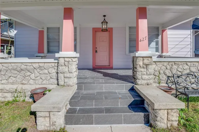 a bathroom with a bathtub and shower