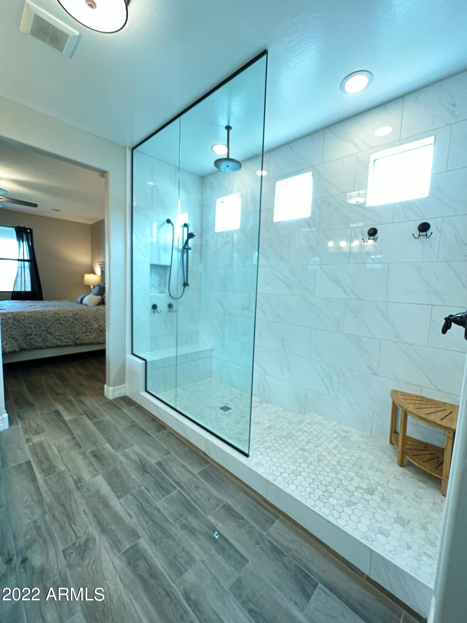 3330 West Fremont Rd. Phoenix, AZ 85041 - Photo 14 of 43 a bathroom with a shower