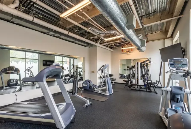 a view of a room with gym equipment