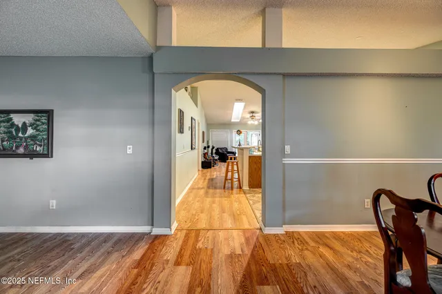a view of a living room and a swimming pool