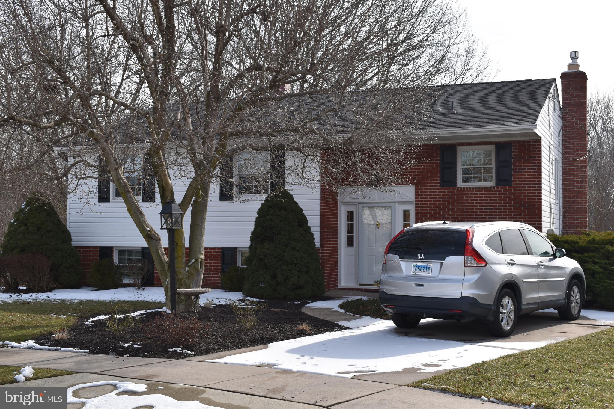 4420 Wynn Road Baltimore, MD 21236 - Photo 1 of 43 a car parked in front of a house