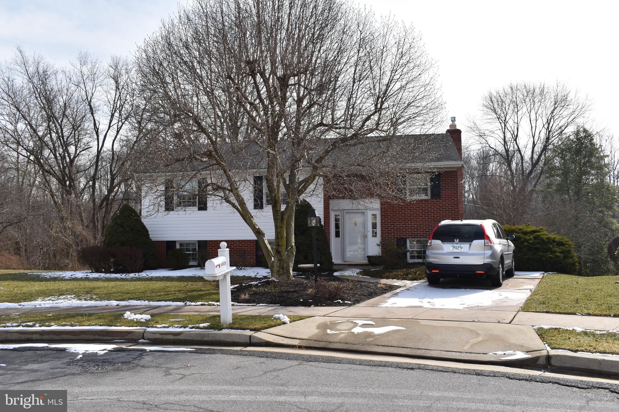 4420 Wynn Road Baltimore, MD 21236 - Photo 2 of 43 a front view of a house with a yard