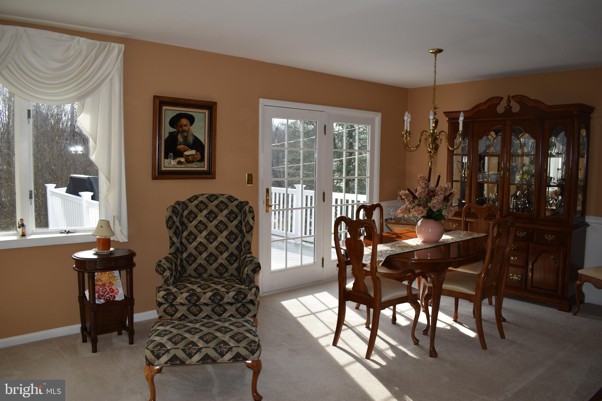 4420 Wynn Road Baltimore, MD 21236 - Photo 12 of 43 a view of a dining room with furniture and chandelier