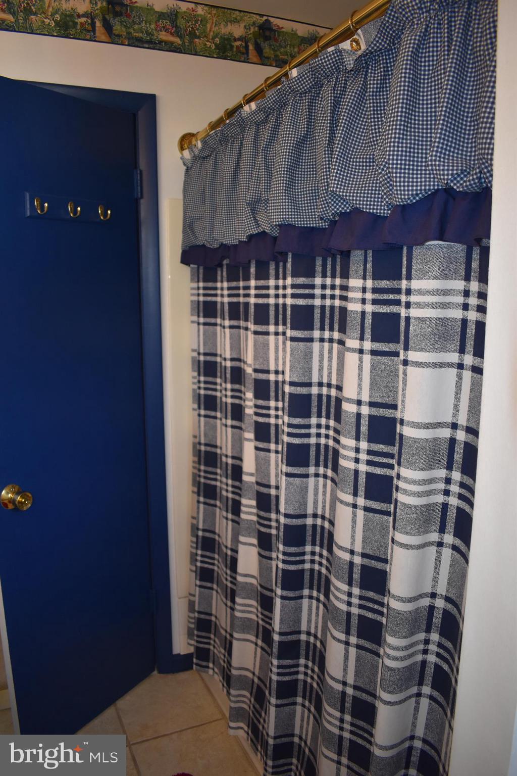 4420 Wynn Road Baltimore, MD 21236 - Photo 19 of 43 a bathroom with a shower
