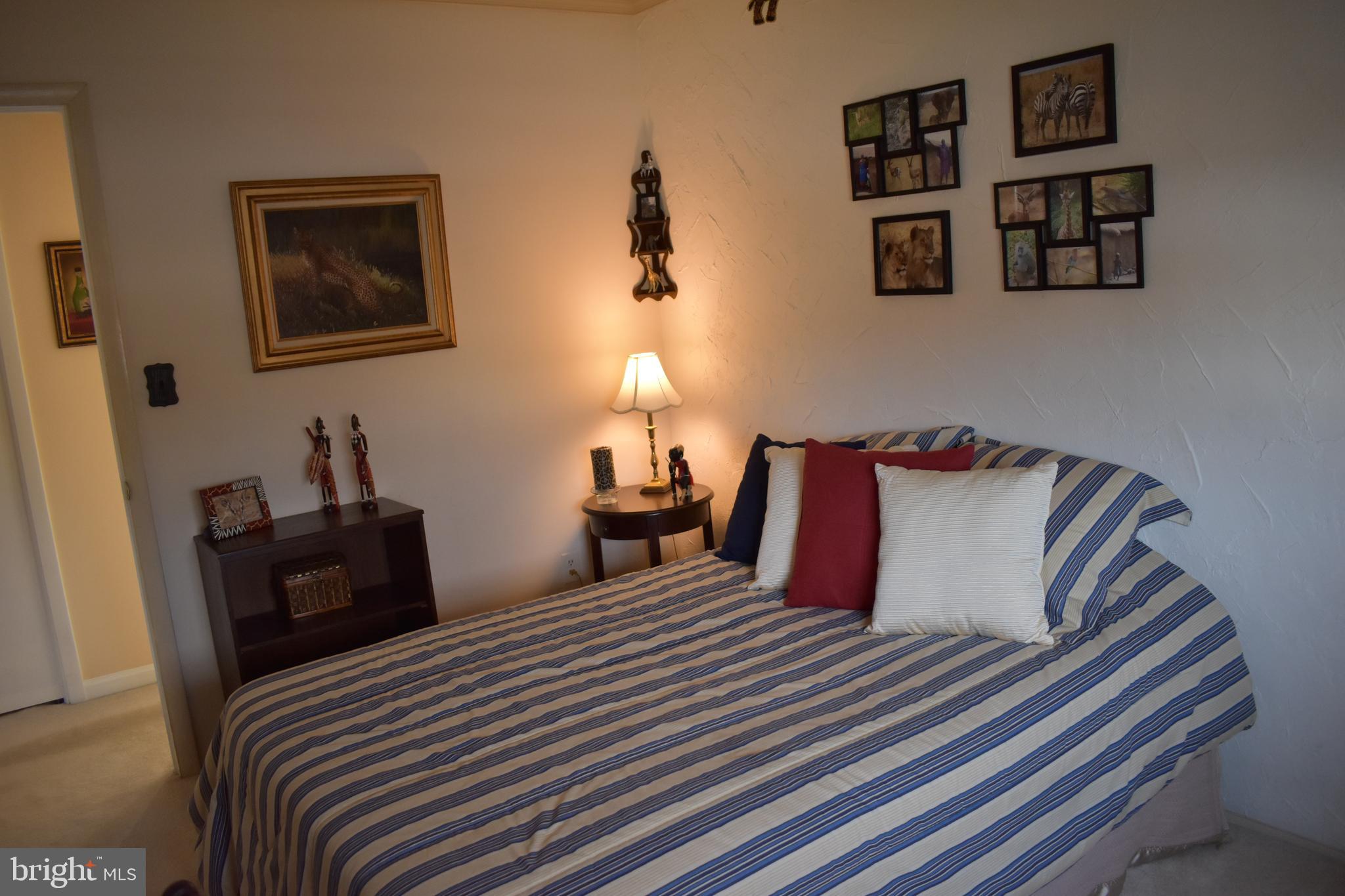 4420 Wynn Road Baltimore, MD 21236 - Photo 22 of 43 a bedroom with bed and night stand