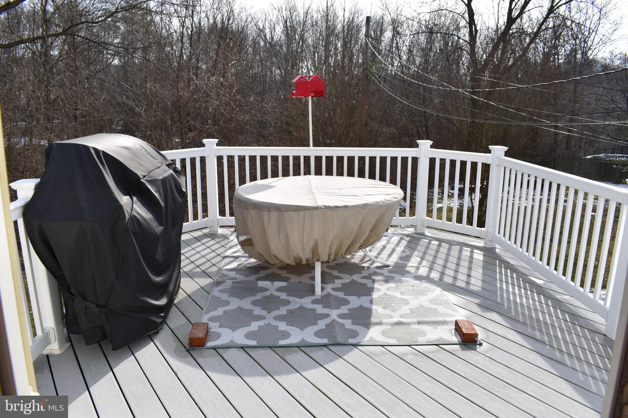 4420 Wynn Road Baltimore, MD 21236 - Photo 36 of 43 a view of balcony with wooden floor and outdoor seating
