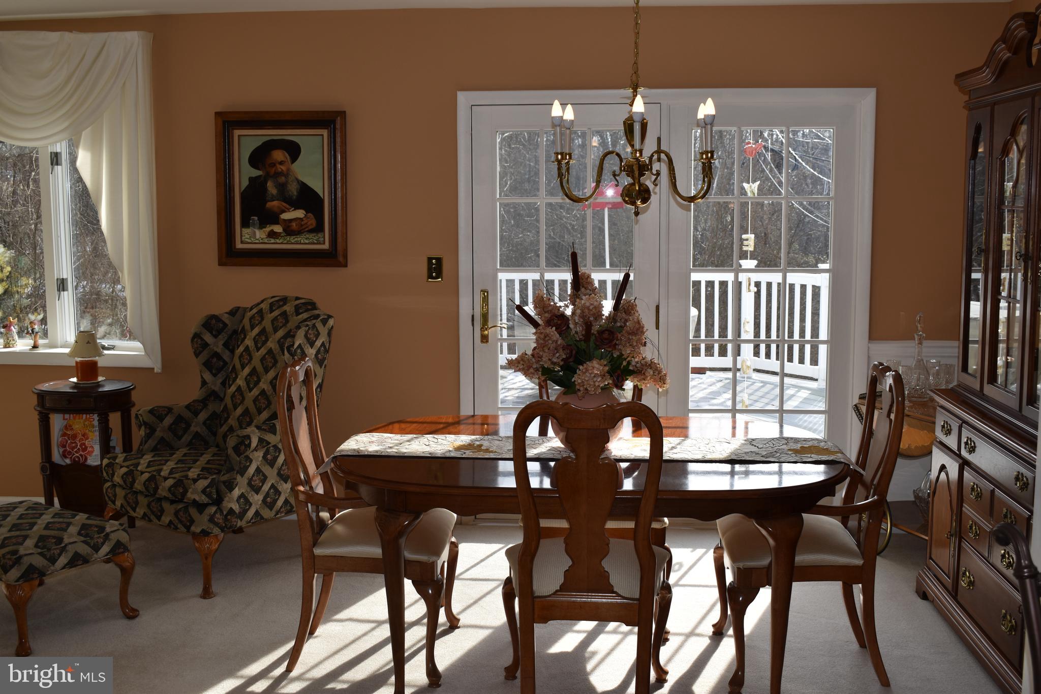 4420 Wynn Road Baltimore, MD 21236 - Photo 7 of 43 a view of a dining room with furniture and chandelier