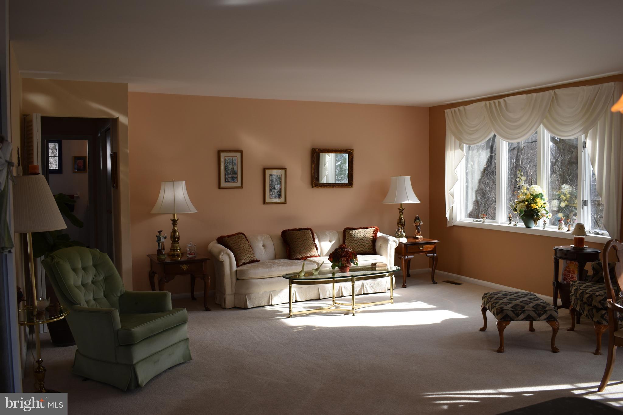 4420 Wynn Road Baltimore, MD 21236 - Photo 8 of 43 a living room with furniture and a large window
