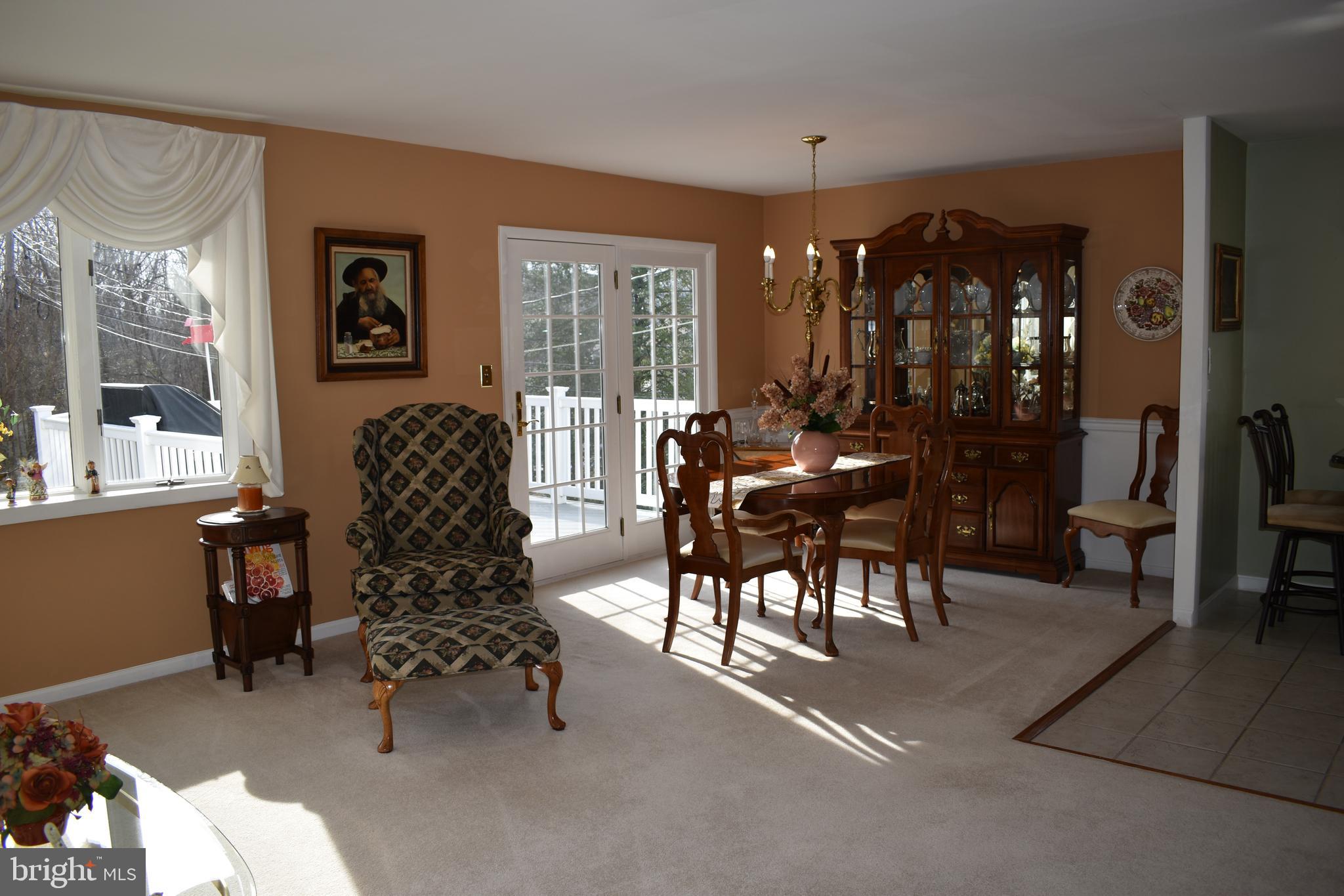 4420 Wynn Road Baltimore, MD 21236 - Photo 9 of 43 a living room with furniture and a large window