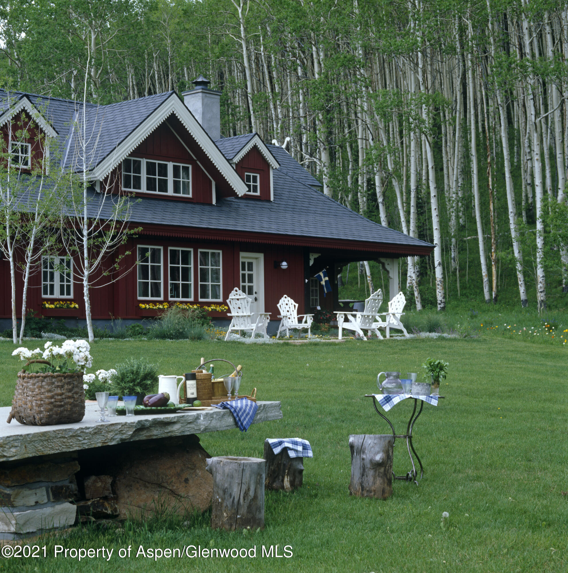 2500 Little Annie Road Aspen, CO 81612 - Photo 1 of 18 a front view of a house with garden