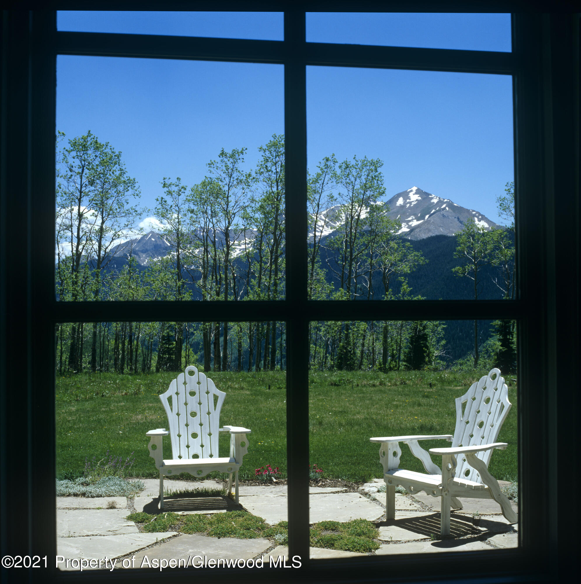 2500 Little Annie Road Aspen, CO 81612 - Photo 15 of 18 a view of a small yard from a window