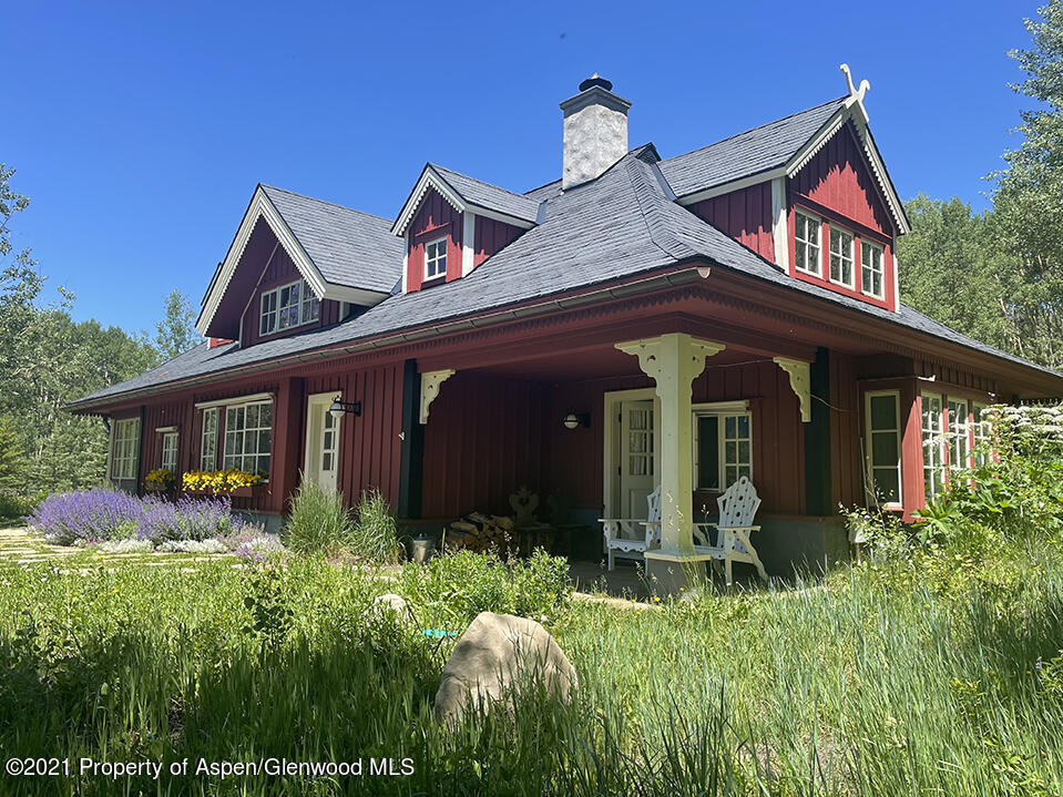 2500 Little Annie Road Aspen, CO 81612 - Photo 2 of 18 a front view of house with a garden