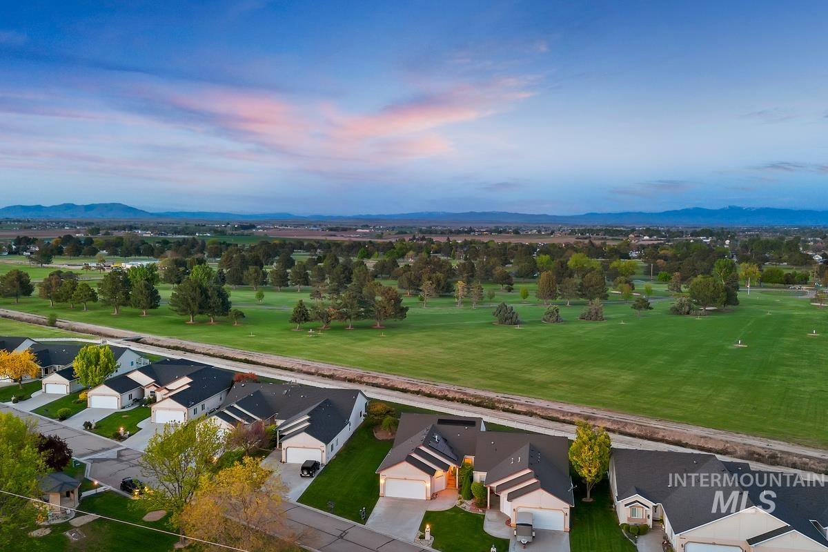 25074 The Driving Lane Caldwell, ID 83607 - Photo 2 of 32 Residential properties bordering a expansive green golf course