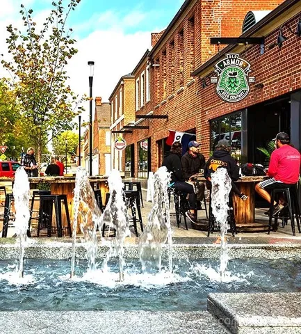 a view of a building with sitting area