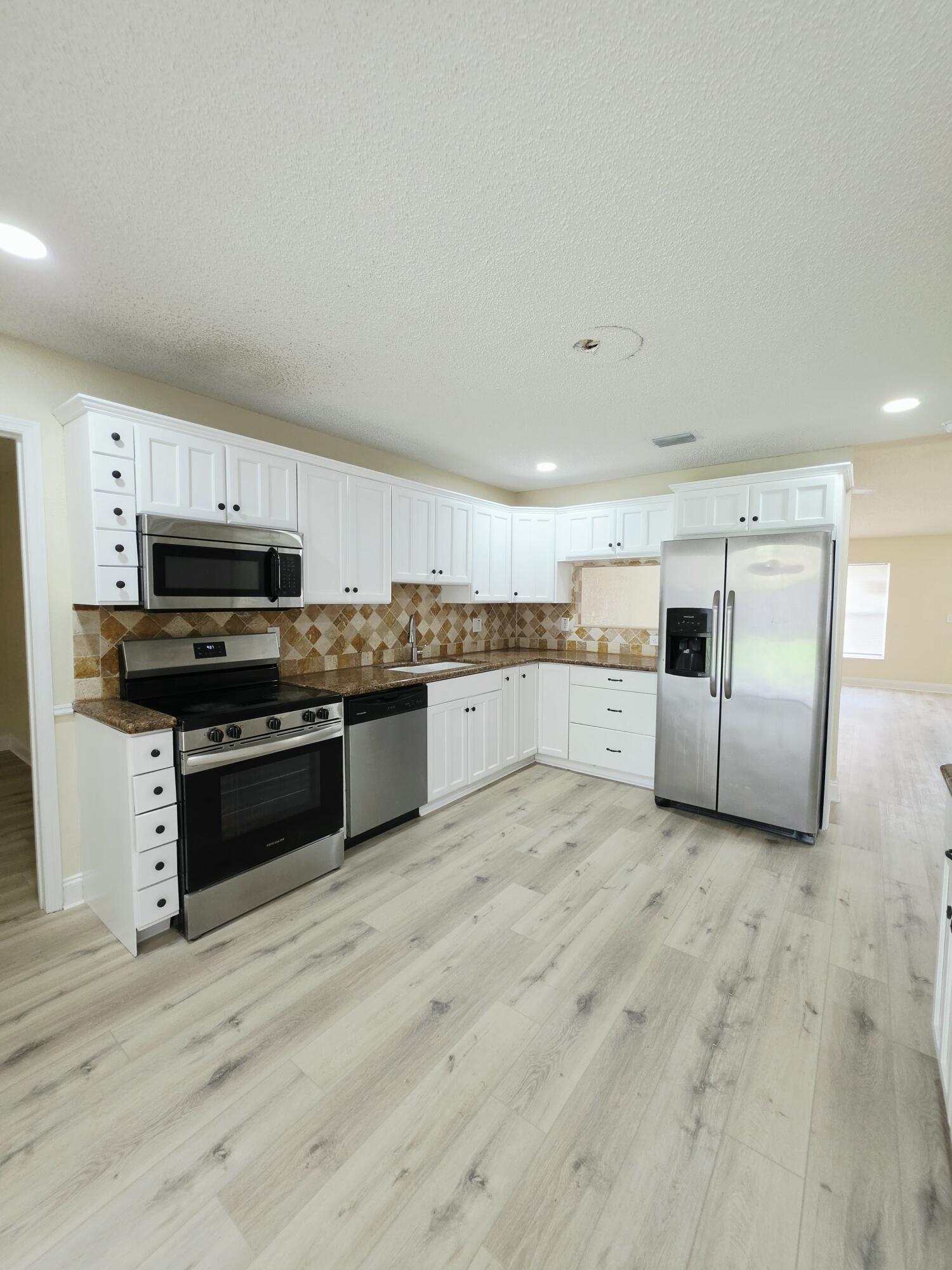 5447 Twin Oakes Road Lake Worth, FL 33463 - Photo 2 of 17 20260702_114557