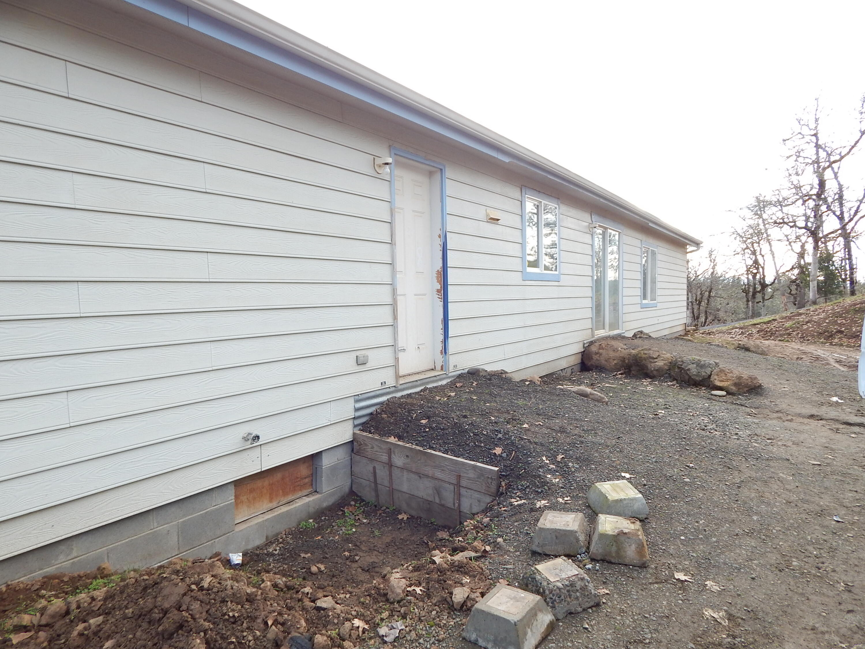20555 Sawyer Road Shady Cove, OR 97539 - Photo 2 of 16 Back porches were taken off due to lack of permits.