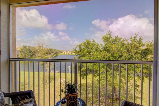 a view of balcony with furniture