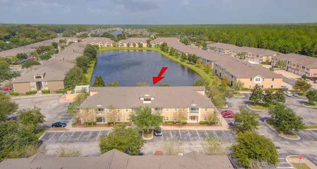 an aerial view of a house with a garden