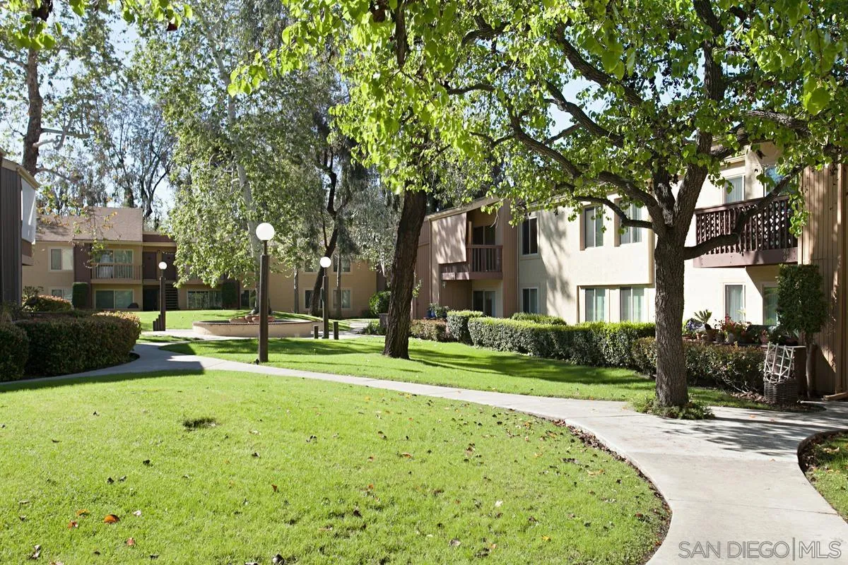 5906 Rancho Mission Road, Unit 5 San Diego, CA 92108 - Photo 32 of 33 a view of a park with large trees