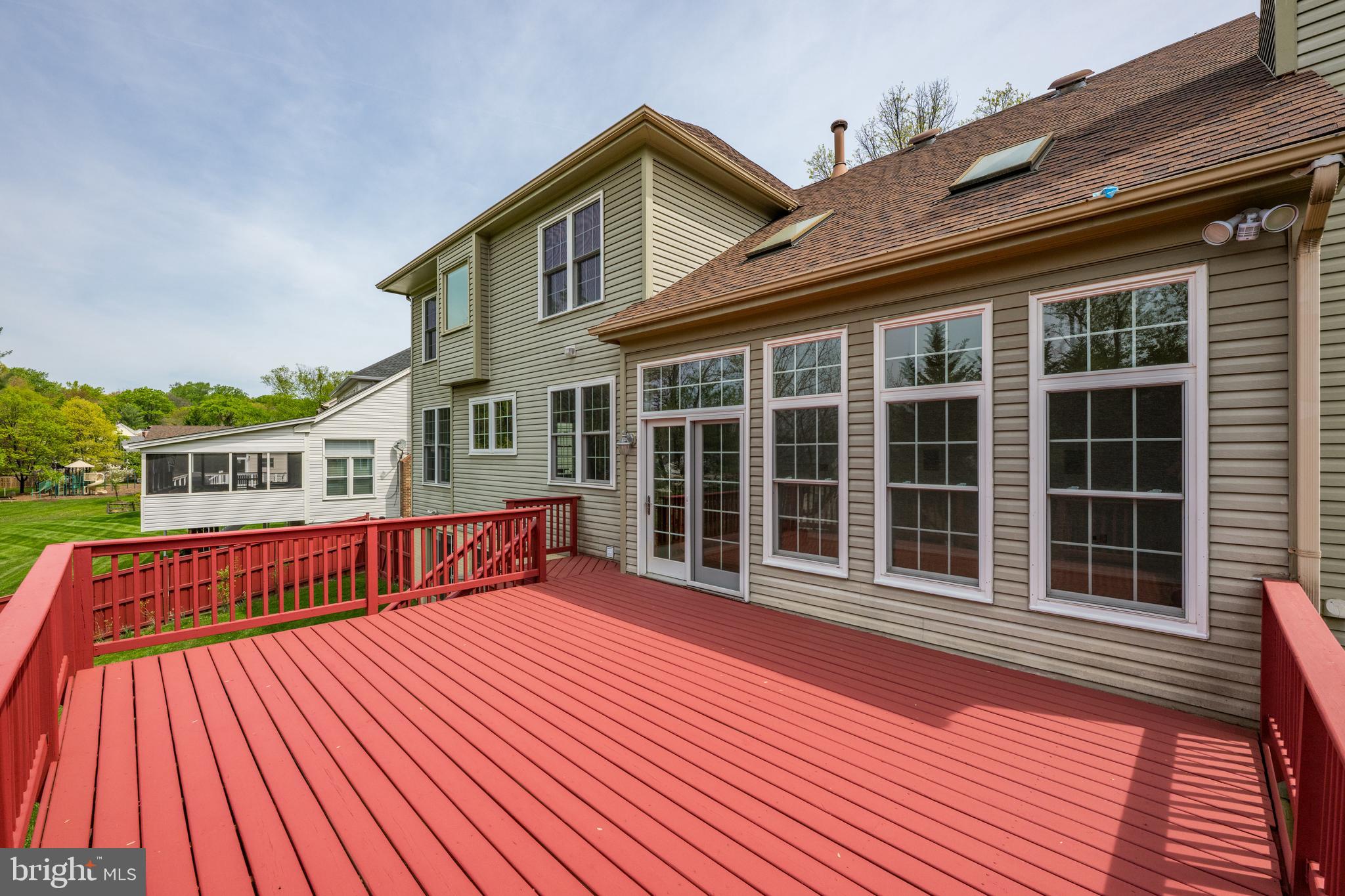 409 Midsummer Drive Gaithersburg, MD 20878 - Photo 18 of 41 a view of a house with a deck