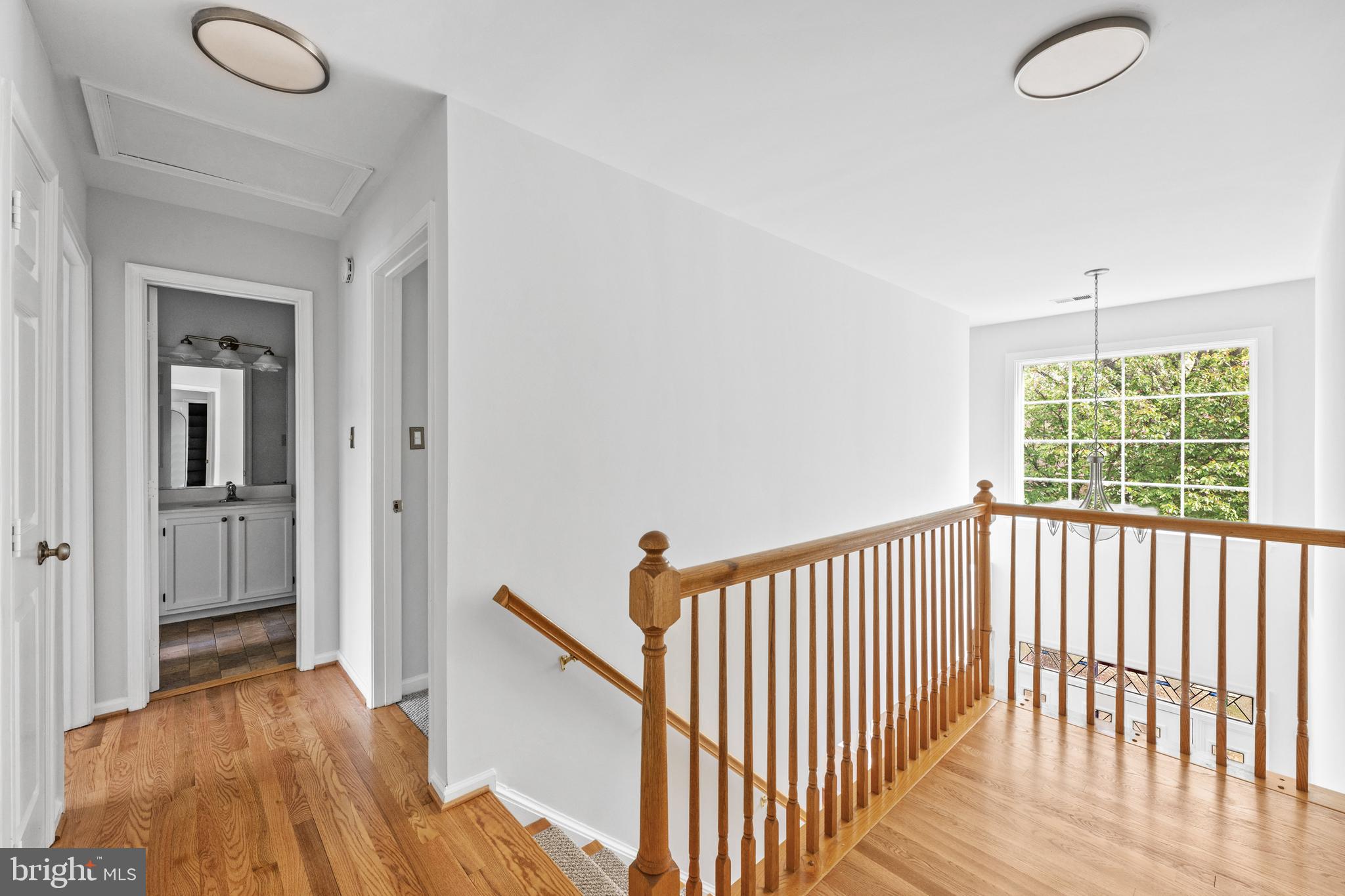 409 Midsummer Drive Gaithersburg, MD 20878 - Photo 21 of 41 a view of a hallway with a window