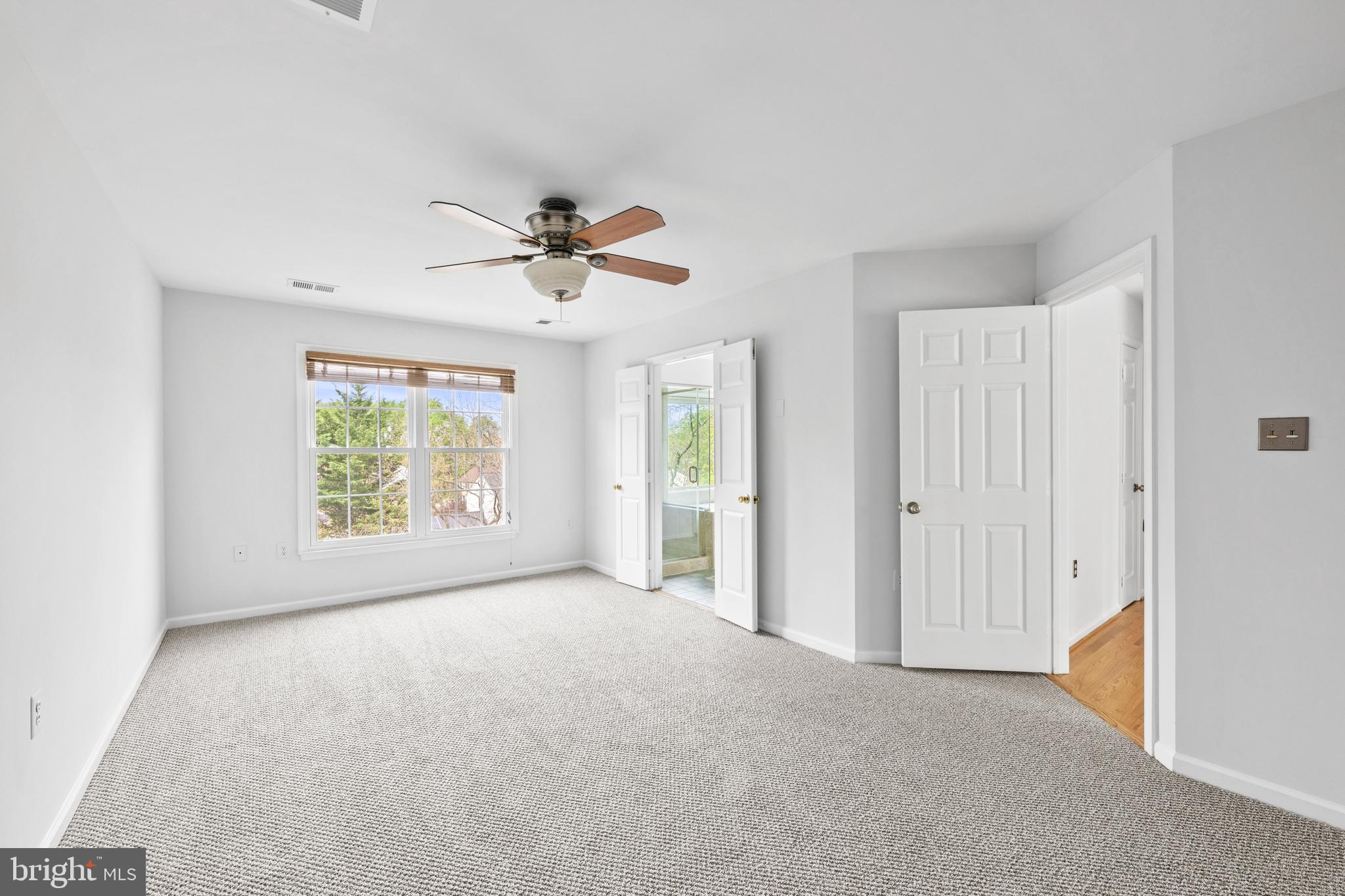 409 Midsummer Drive Gaithersburg, MD 20878 - Photo 22 of 41 a view of an empty room with a window