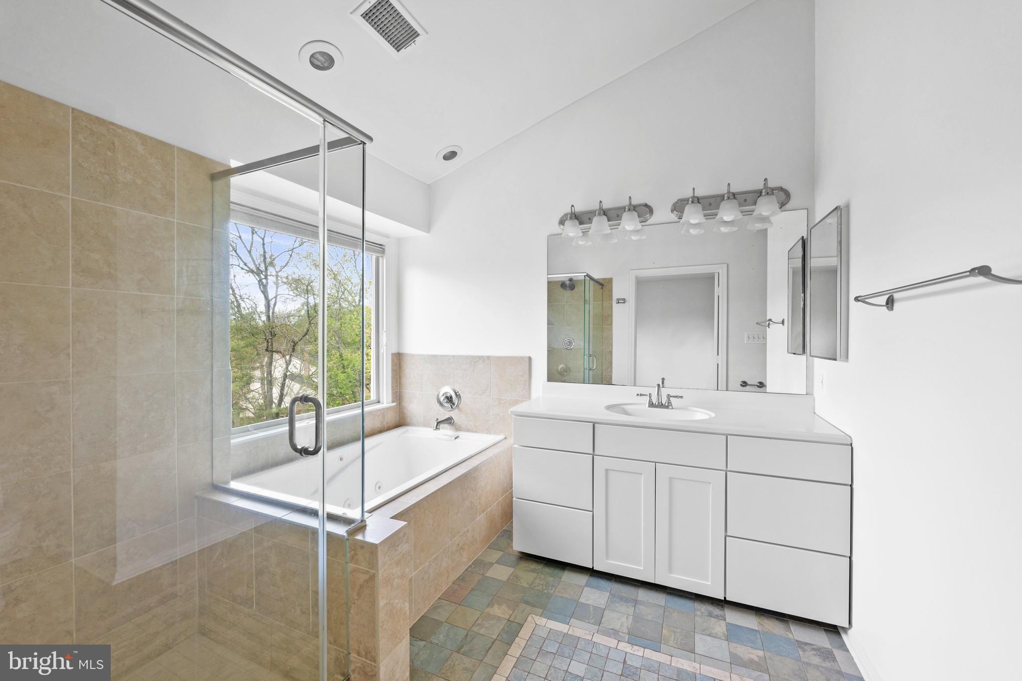 409 Midsummer Drive Gaithersburg, MD 20878 - Photo 25 of 41 a bathroom with a double vanity sink mirror and