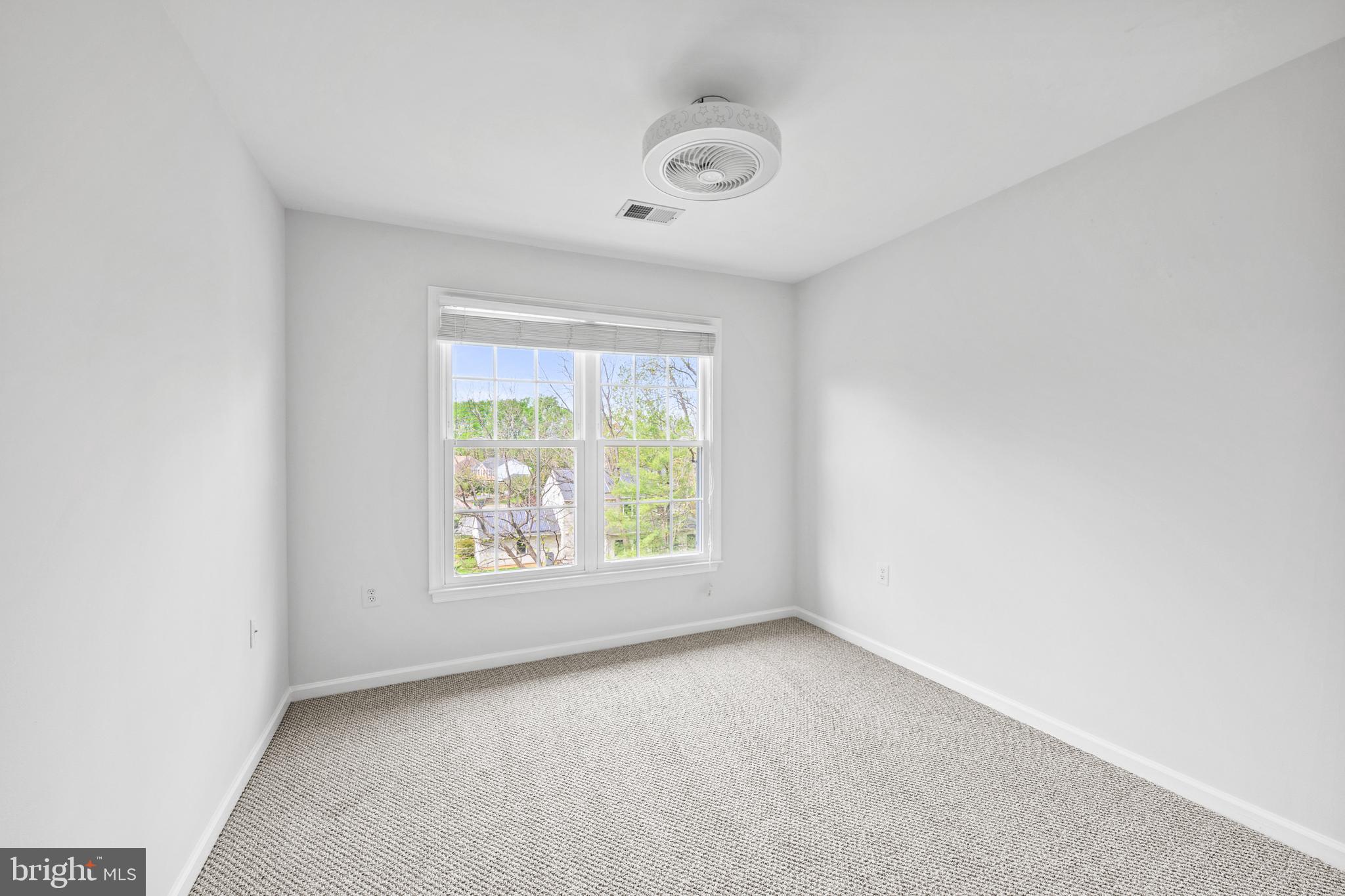 409 Midsummer Drive Gaithersburg, MD 20878 - Photo 29 of 41 an empty room with windows