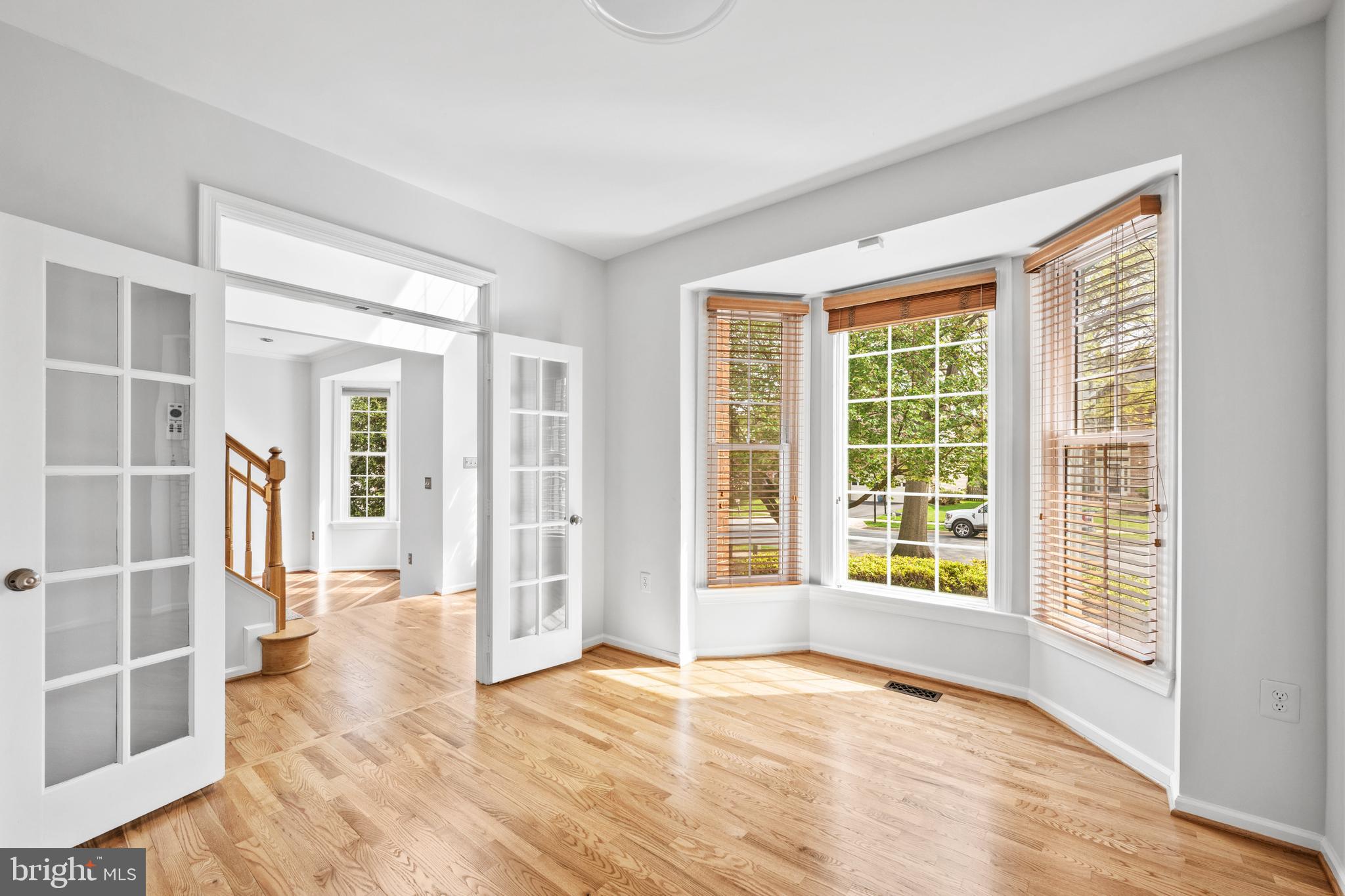 409 Midsummer Drive Gaithersburg, MD 20878 - Photo 4 of 41 a view of an empty room with a window