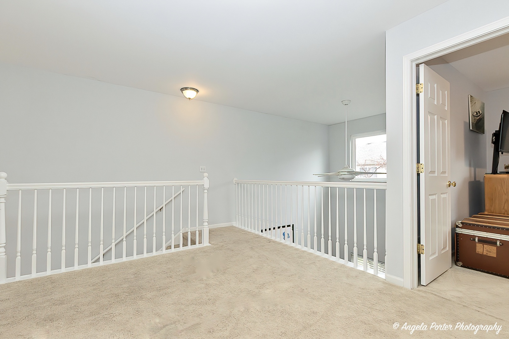 360 Tower Drive Hainesville, IL 60030 - Photo 18 of 22 a view of a hallway with a livingroom