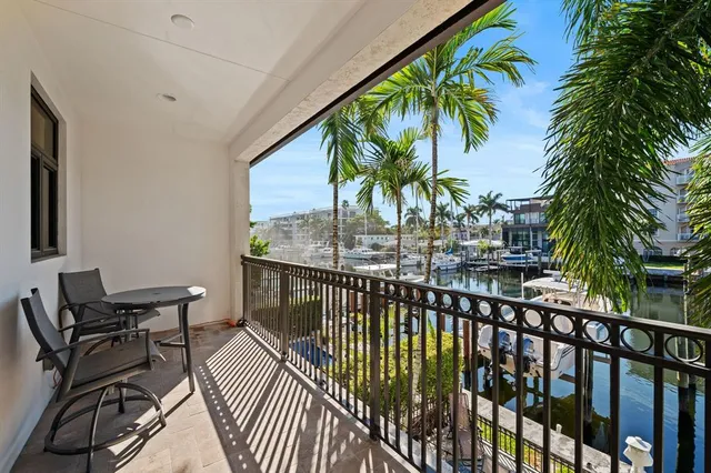 a view of balcony with furniture