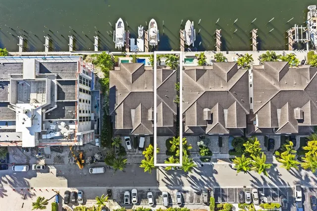 a view of a building with a yard