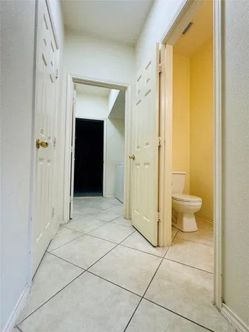 a view of a bathroom with a glass door and a shower