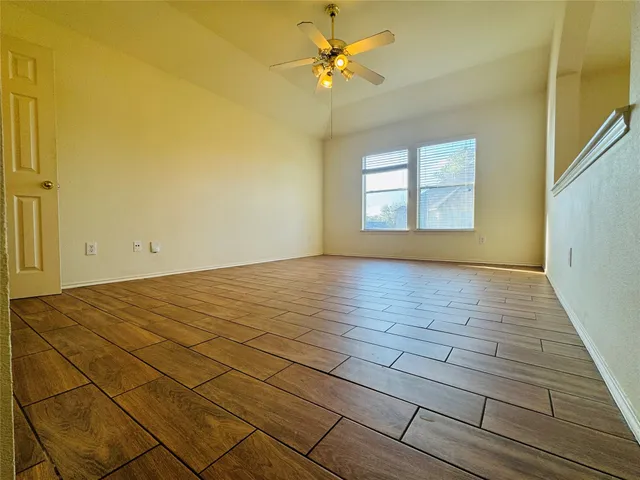 a view of an empty room and window