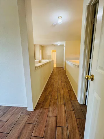 a view of a hallway from a hallway