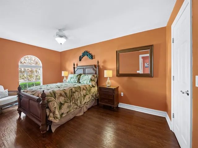 a bathroom with a sink toilet a mirror and shower