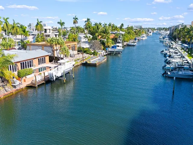 an aerial view of a house with a ocean view