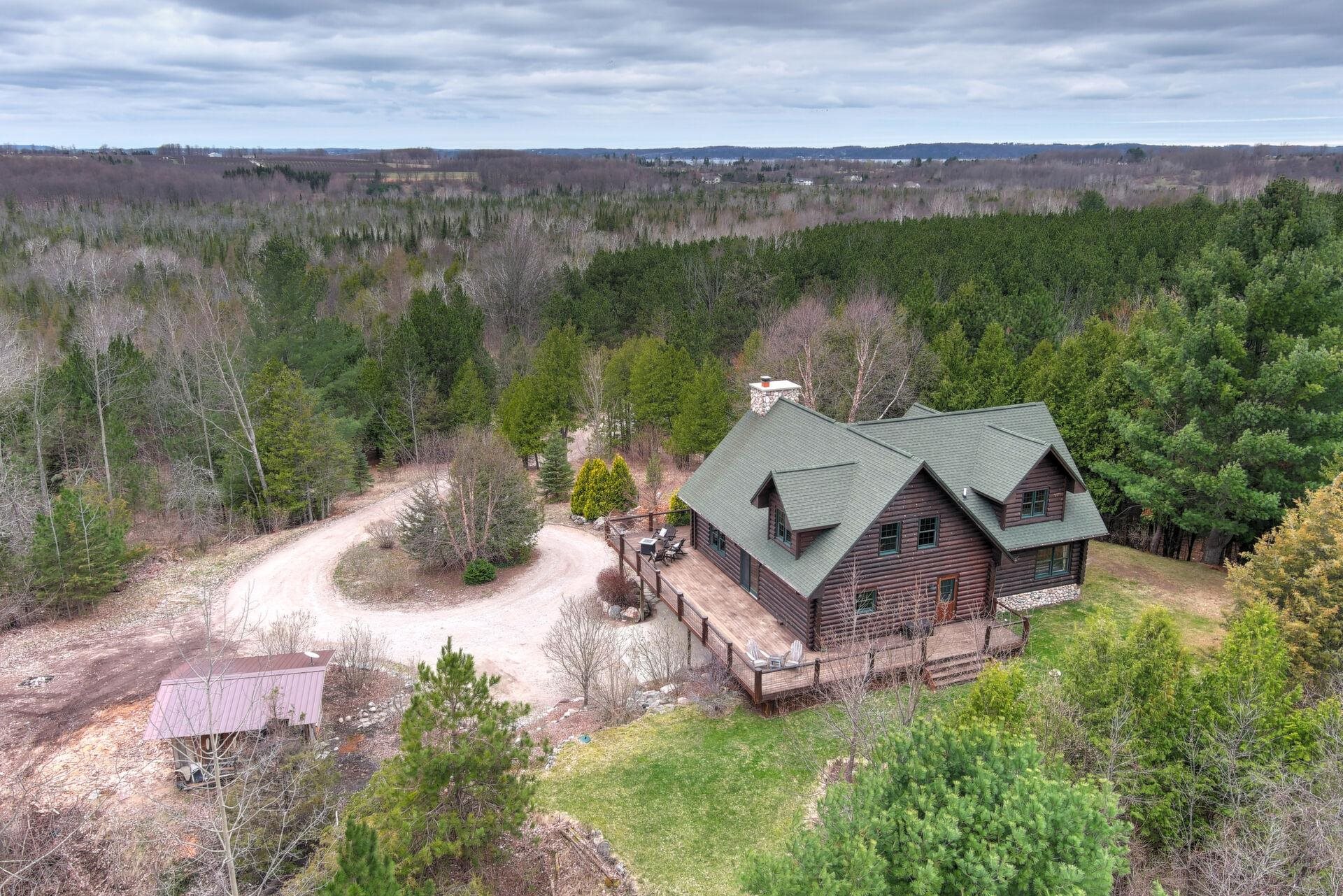 7828 Bennett Road Williamsburg, MI 49690 - Photo 2 of 36 1898950-1.JPG