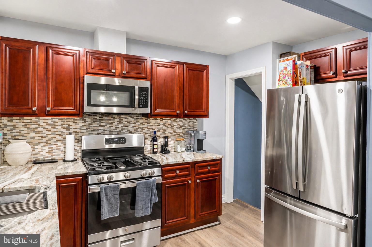 Modern kitchen with rich wood accents.