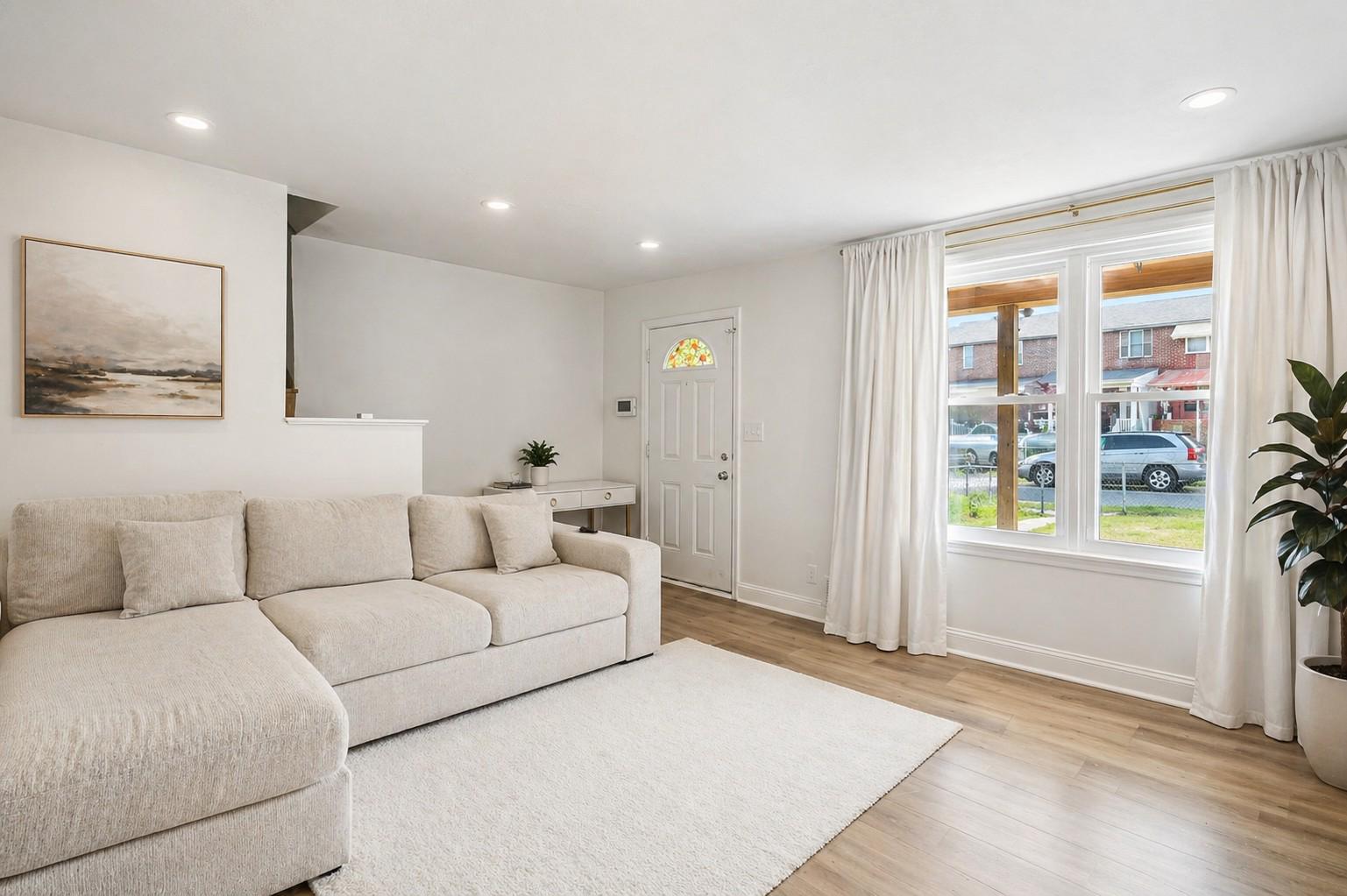 7487 Berkshire Road Baltimore, MD 21224 - Photo 5 of 17 Bright and inviting living room.