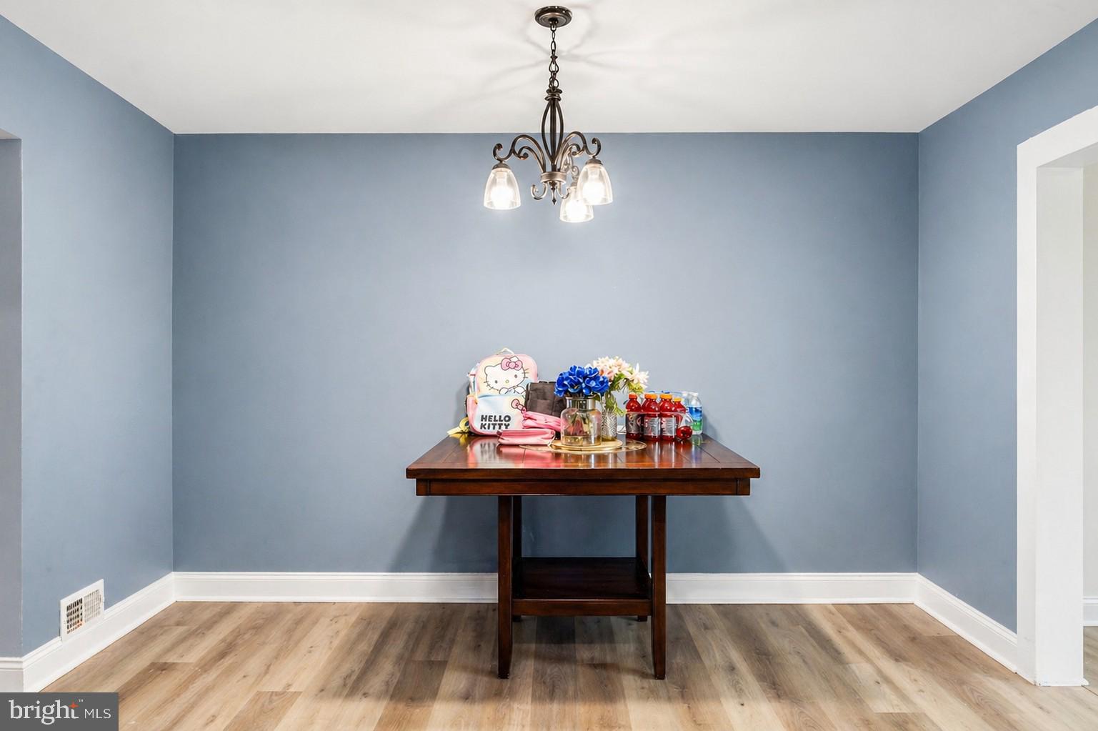 7487 Berkshire Road Baltimore, MD 21224 - Photo 6 of 17 Charming dining space with soft hues.